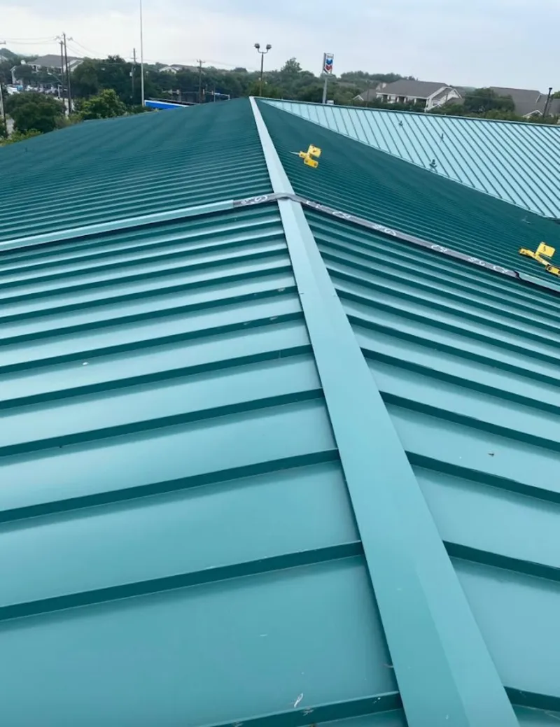 Green commercial metal roof ridge and valley for Metal Roof Repair in South Patrick Shores